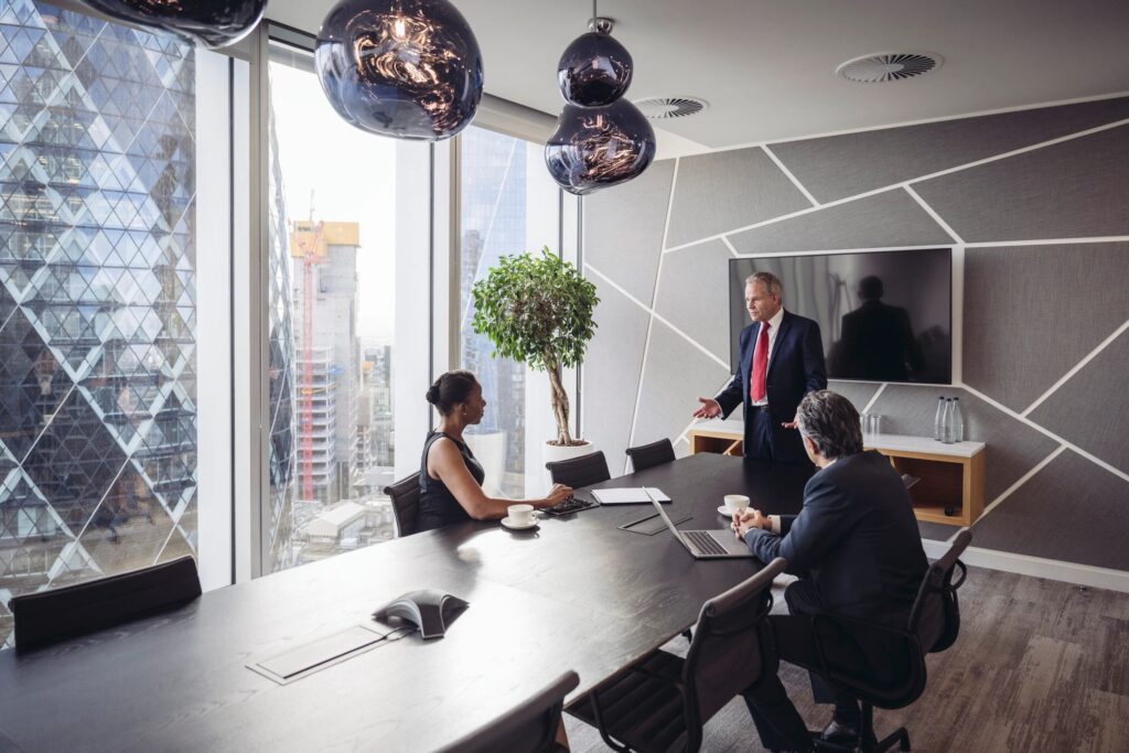 London investment team meeting in modern board room